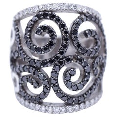 Bague en or, diamants blancs/noirs