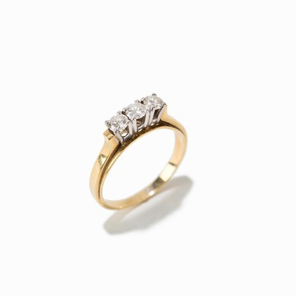 Gold ring with 3 brilliants, 14 carat gold & platinum, 1930s

14 carat gold, platinum
Europe, 1930s
3 brilliant-cut diamonds of 0.18 ct each individually set in platinum
dimensions: 1,4 x 0,4 cm

Ring size: D 61, US 9.5
weight: 4,2 gram
Good