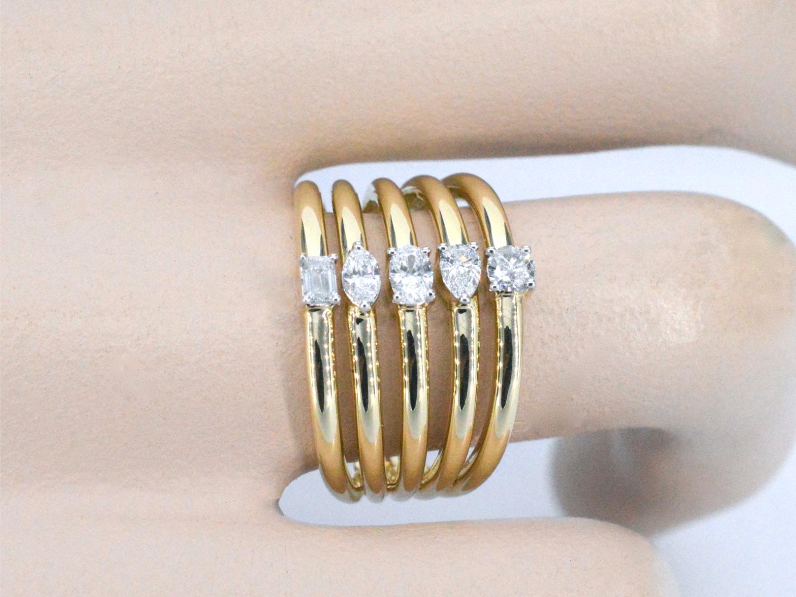 Contemporary Gold ring with 5 special diamonds. For Sale
