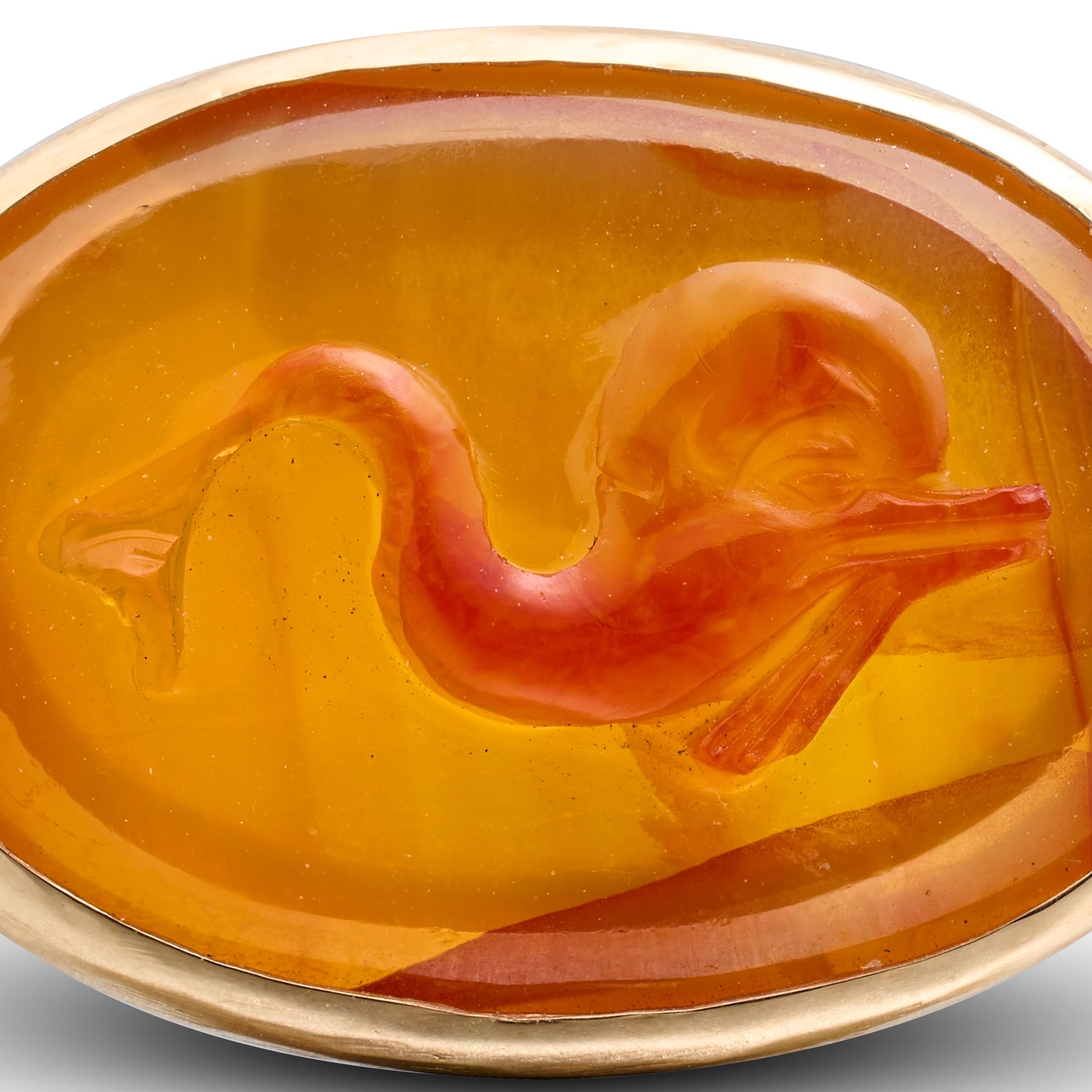 High Carat Gold Ring Set with a Renaissance Carnelian Cameo of a Dolphin.
 
Renaissance cameo, 16th century; modern gold ring mount.
 
Ring Size: Q UK / 8.25 US / 58 EU.

The Cameo Measures: 1.9 × 1.3 cm.


An oval carnelian intaglio carved in low