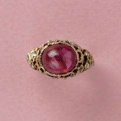 Anello in oro con zaffiro rosa e diamanti