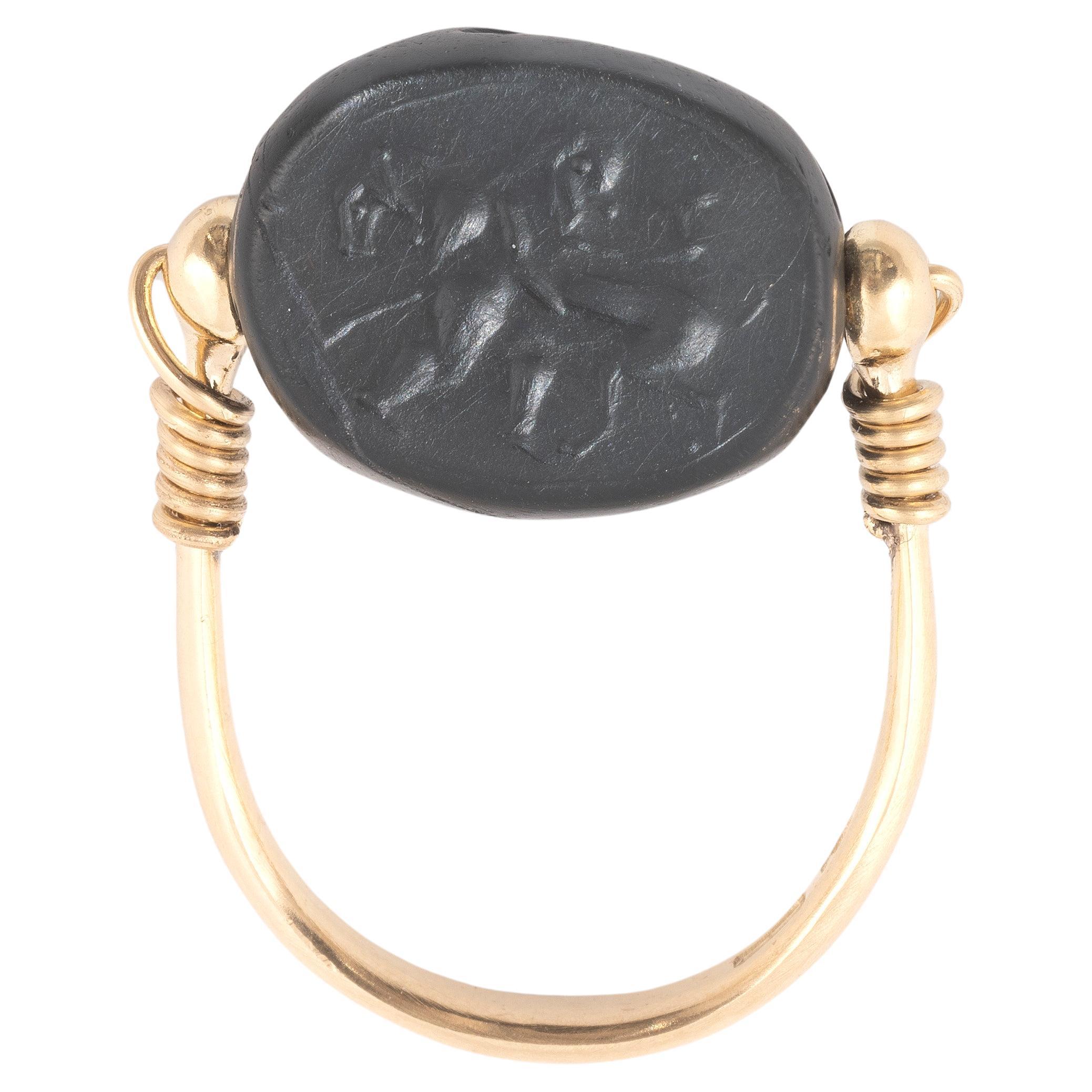 Uncut Gold Ring With An Etruscan Jasper Scarab Of A Sileno Against The Lion