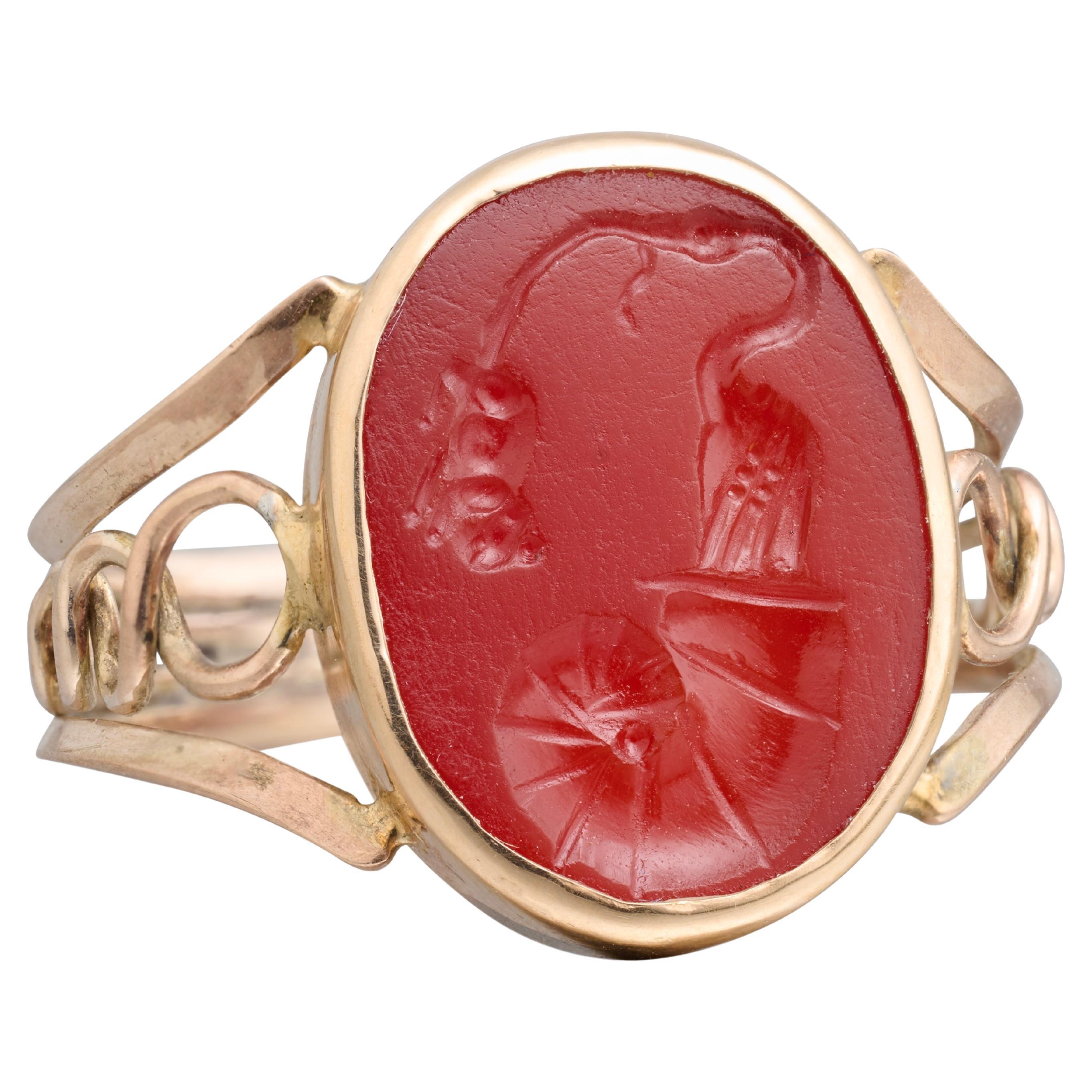 Gold ring with Ancient Roman intaglio of a stork, shell and mouse, 19th century For Sale