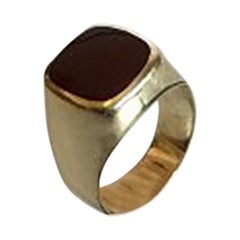 Gold Ring with Dark Red Stone 14 Karat