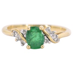 Gold Ring with Diamond and Green Gemstone