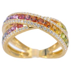 Gold ring with diamonds and multicolour sapphires
