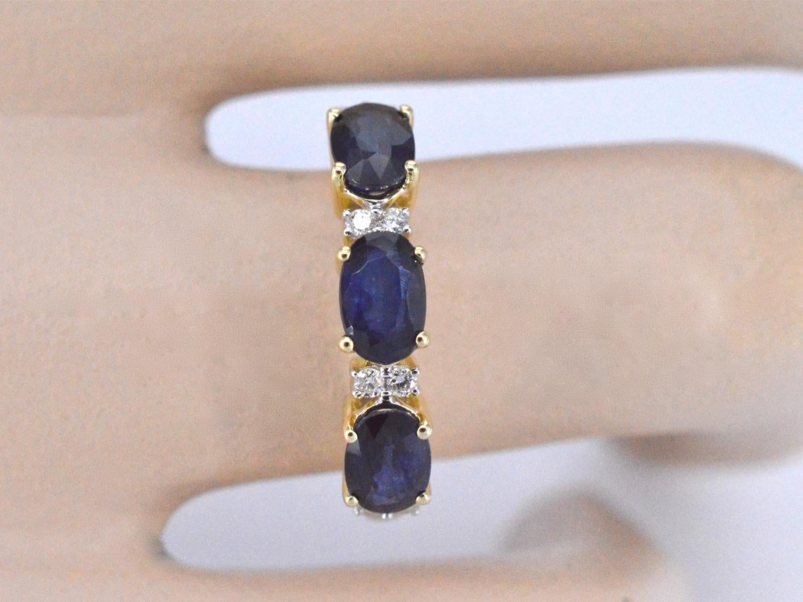 Indulge in the beauty of the gold ring with diamonds and sapphire. Crafted in luxurious gold, this ring features a captivating design adorned with diamonds and a mesmerizing sapphire. The diamonds add a dazzling sparkle, while the sapphire brings a