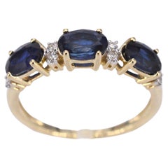 Gold Ring with Diamonds and Sapphire