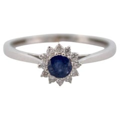 Gold Ring with Diamonds and Sapphire