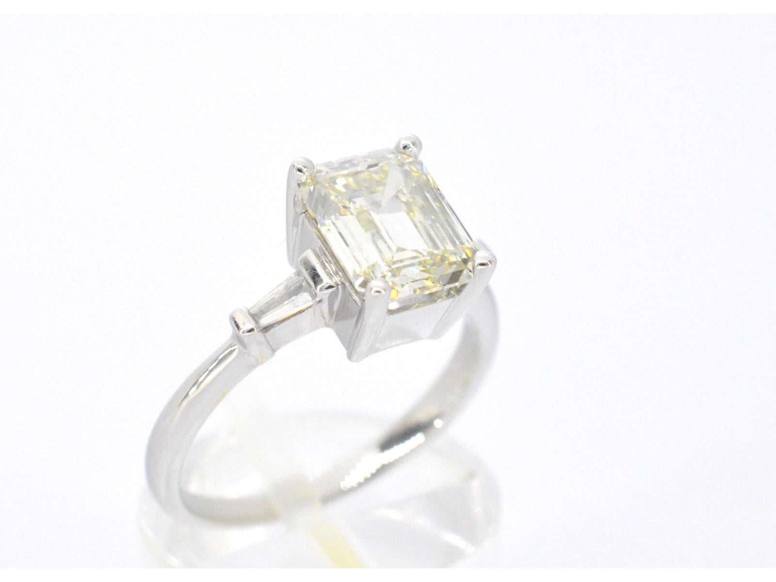 Emerald Cut Gold Ring with Diamonds