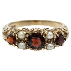 Gold ring with garnets and natural pearls, London, 1968.