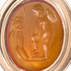 Gold Ring with Roman Carnelian Intaglio of Eros before an Altar.