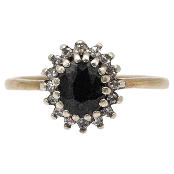 Gold ring with sapphire and diamonds, United Kingdom, mid 20th century.
