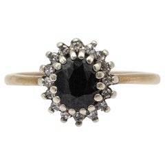 Gold ring with sapphire and diamonds, United Kingdom, mid 20th century.