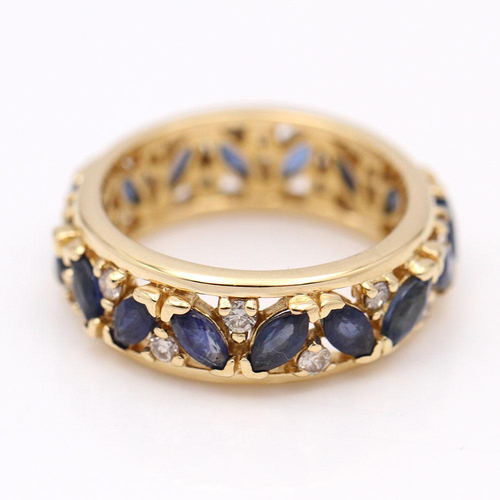 Gold ring with Diamonds and Sapphires for woman  16 Diamonds in Brilliant cut with total weight 0,30ct  16x Marquisse cut Sapphires of measures 4x2mm each one with a total weight approx. 1,65ct  Size 17, this ring does not allow modification of size