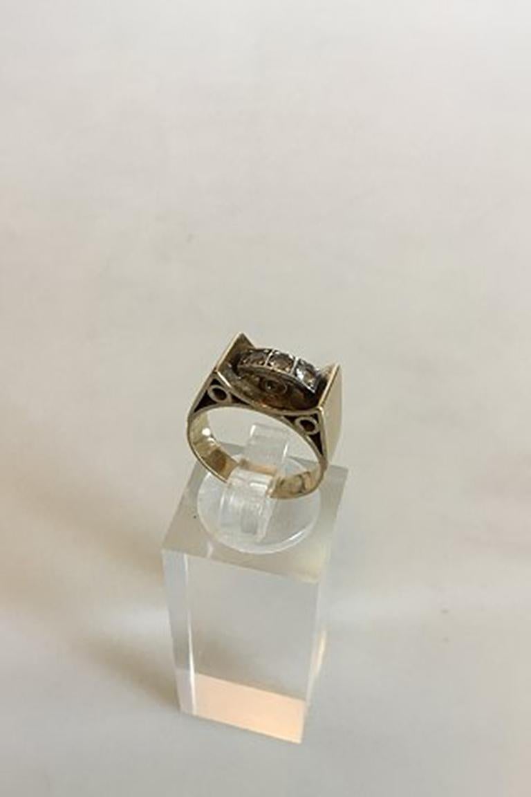 Gold Ring with three Brilliants. 14 K. Ring Size 48 / 4 1/2. Weighs 5.41 g / 0.19 oz.