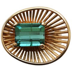 Gold Ring with Wirework and an Emerald Cut Green Tourmaline