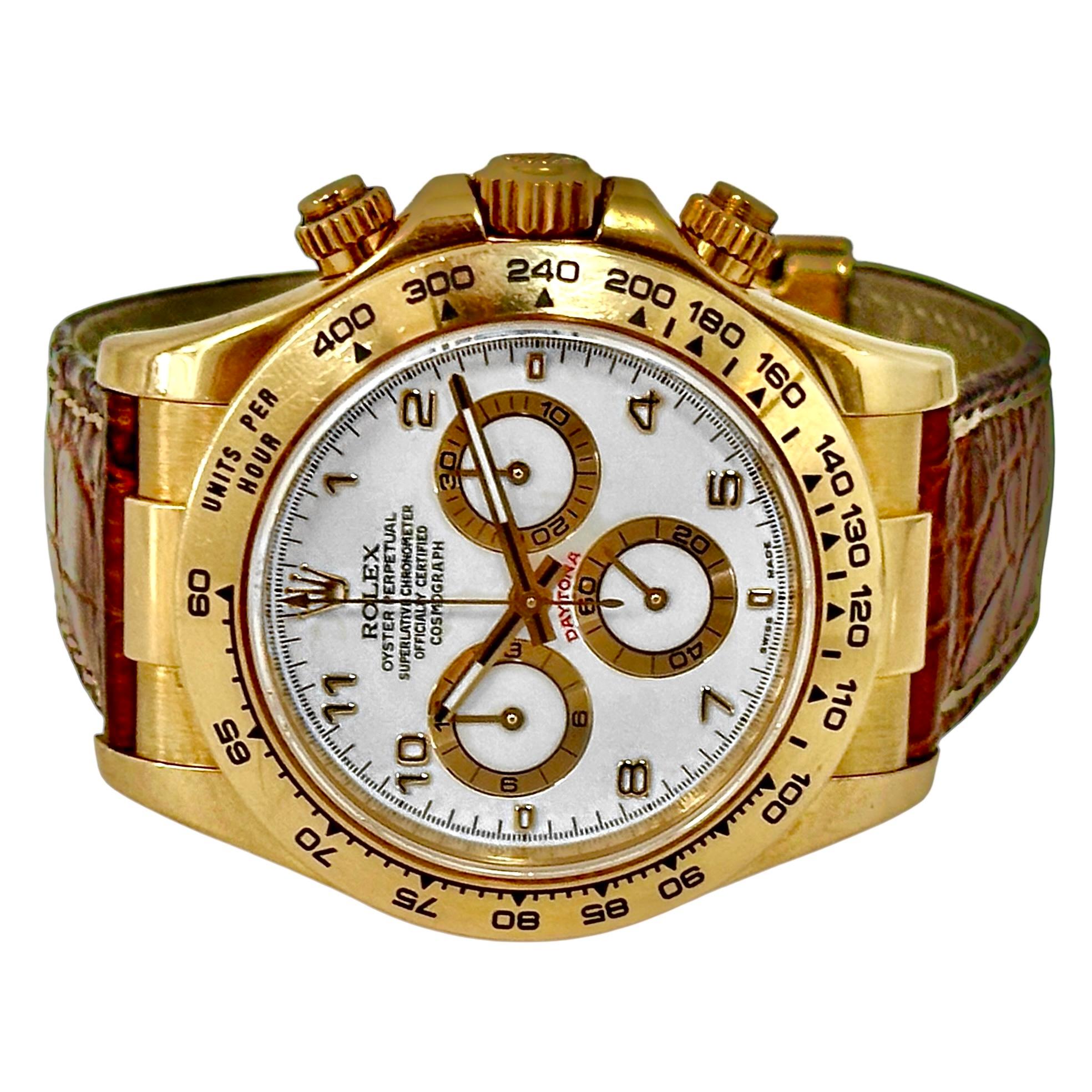 One men's 18K yellow gold Rolex Cosmograph Daytona wristwatch, reference number 116518. This stylish and much sought after timepiece features a Rolex calibre 4130 movement to power its functions as a chronograph/tachymeter. The 40mm diameter head