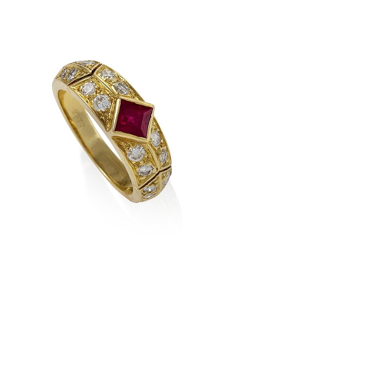 The design of this Van Cleef & Arpels ruby and diamond ring centers on a brilliantly-hued, bezel-set, square-cut ruby. Flanked by diamonds, deep-set into a gold arrow-motif channel, the ring possesses all the totemic power of an ancient gem. The