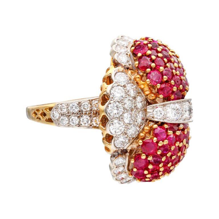  Bombé design, set with 62 round rubies and 61 round brilliant cut diamonds.

Rubies weighing a total of approximately 5.00 carats
Diamonds weighing a total of approximately 4.55 carats
18 karat white gold and 14 karat yellow gold
Total weight 18.83