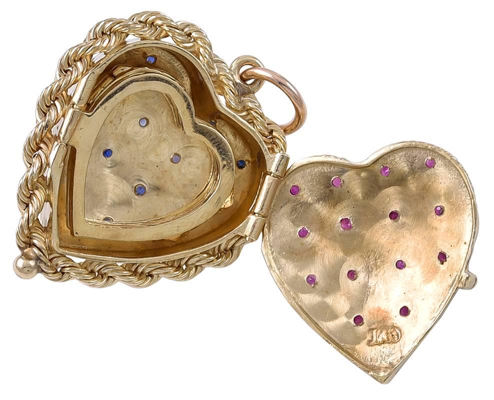 Gold Ruby and Sapphire Six Picture Locket In Excellent Condition In New York, NY