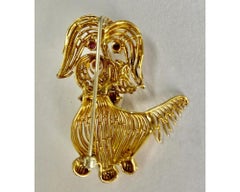 Broche de oro de rubí para perro