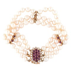 Bracelet multibrins en or, saphir et perle
