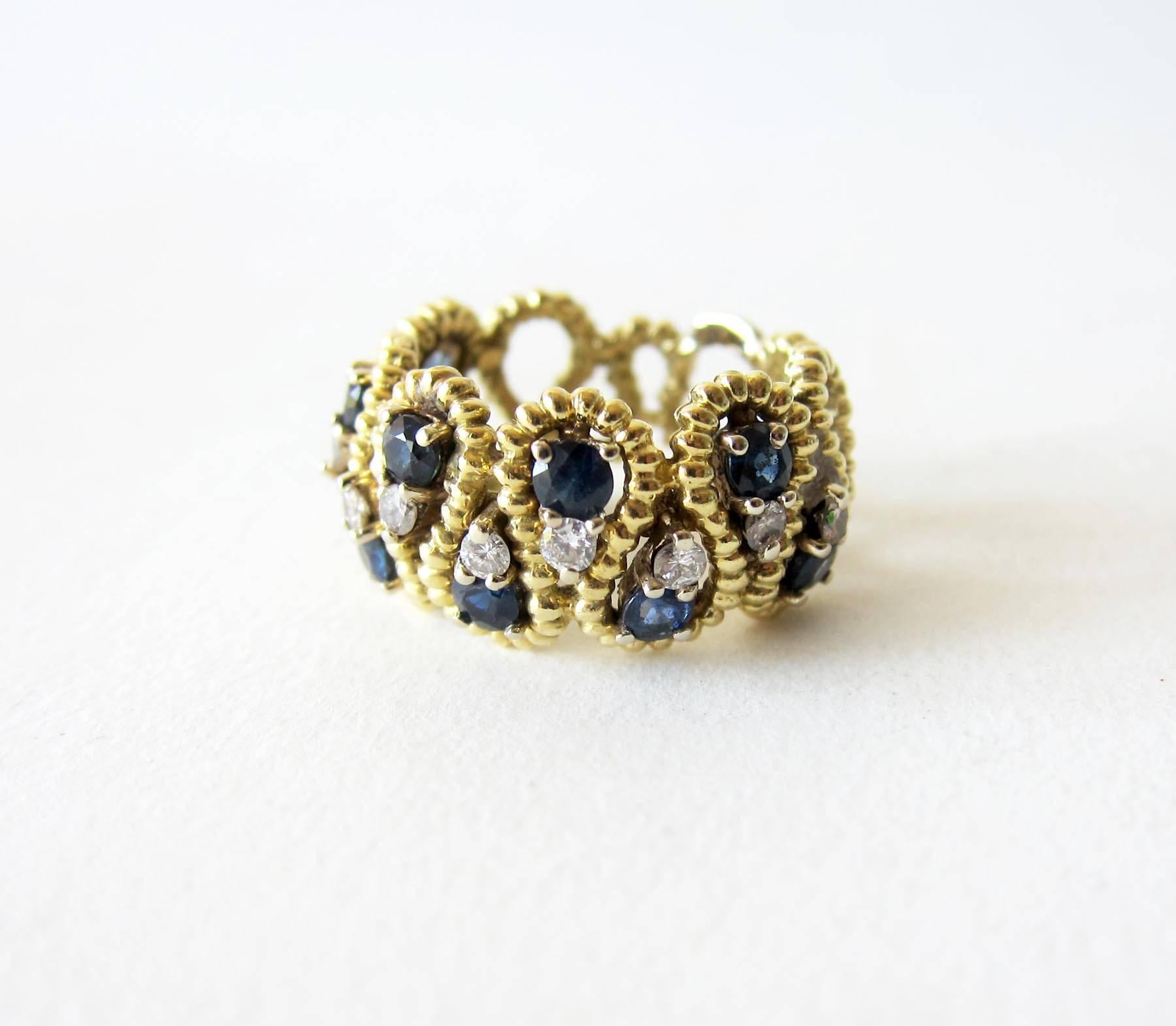 18k gold, sapphire and diamond lattice ring circa 1950's.  Ring is a finger size 7.5 to 8 due to its unusual shape.  Unsigned.  11.5 grams.