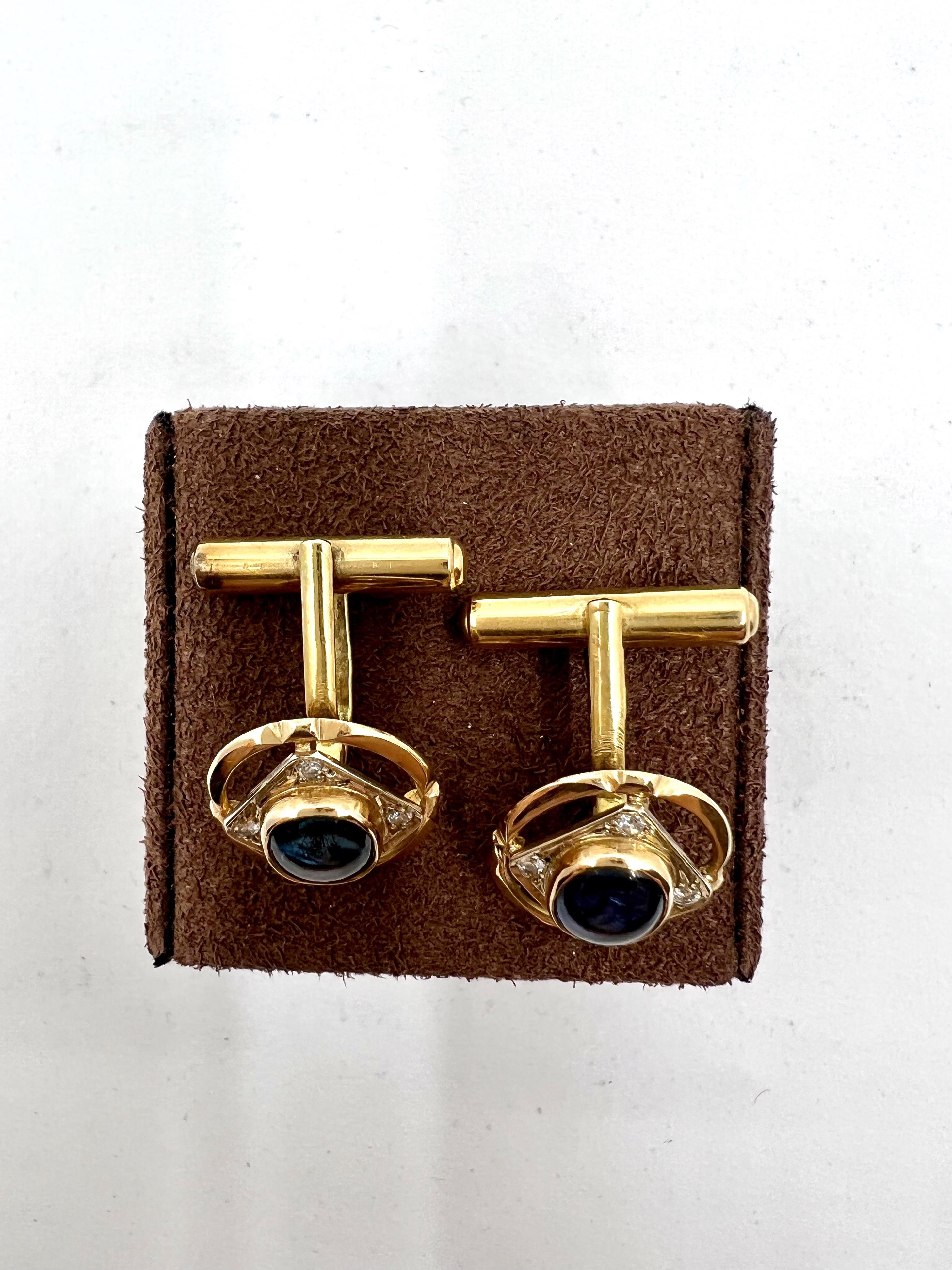 Very elegant cufflinks in yellow gold set with cabochon cut blue sapphirs and diamonds. 
Year : 40'
Weight : 10,2 grs