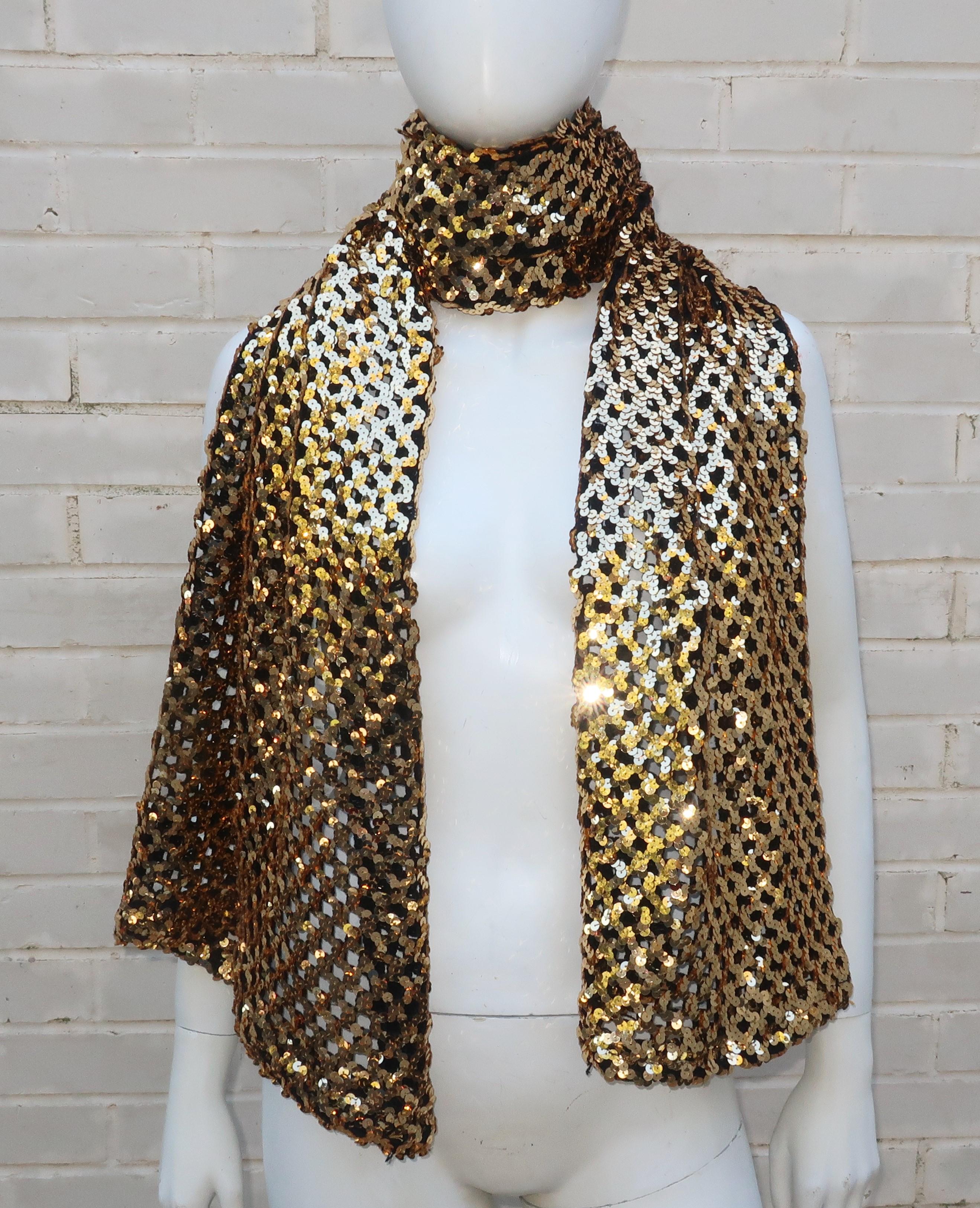 Sassy sequins!  Wrap yourself in a black wool knit crochet scarf embellished on one side with gold sequins that shimmer at every turn.  The 71