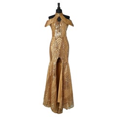 Gold sequin evening dress with split in the front and laces in the back 