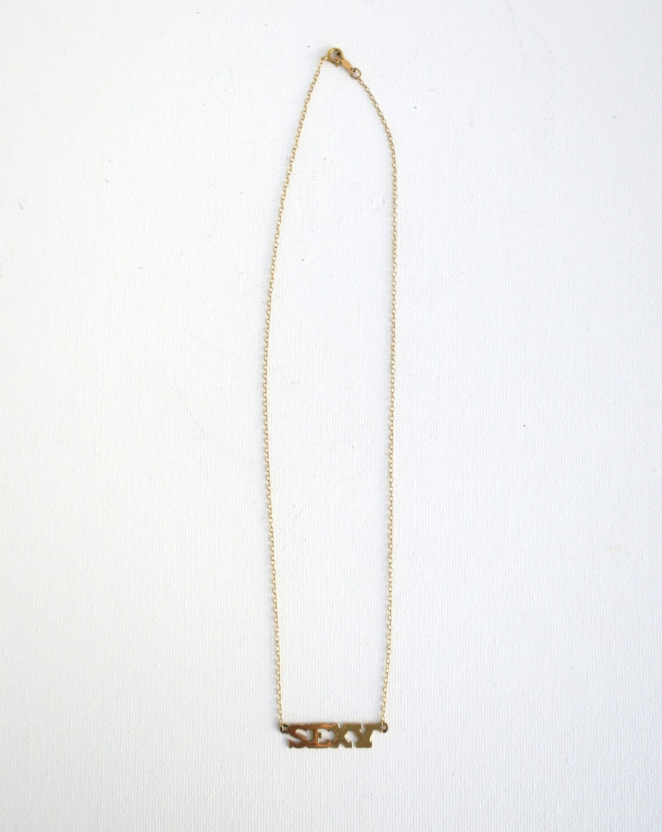 Modern Gold Sexy Nameplate Necklace For Sale