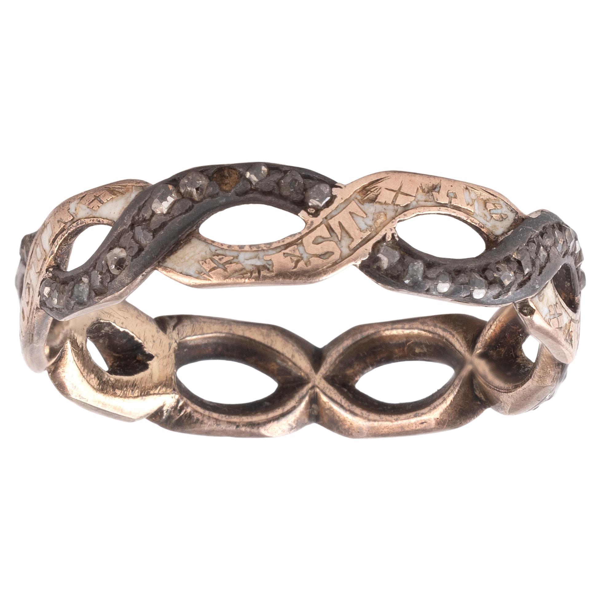 Anillo del siglo XIX en oro de 585 milésimas, esmalte y plata engastada con brillantes,  con la inscripción francesa 