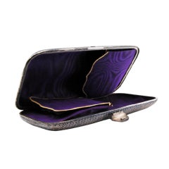 Gold & silver cigar case w/ two purple fabric compartments & a matchbox function