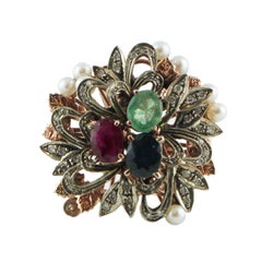 gold silver diamond ruby sapphire and emerald are Gold Silver Diamond Sapphire Ruby Emerald Pearl Cluster Ring