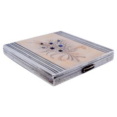 Gold-silver fluted toiletry box with flowers and blue crystals