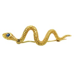 Goldene Schlangennadel