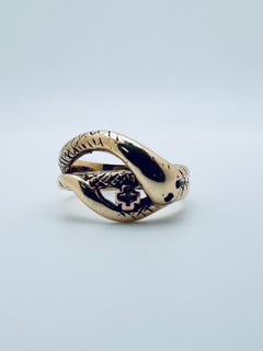 Gold Snake Ring with Rudy Eyes