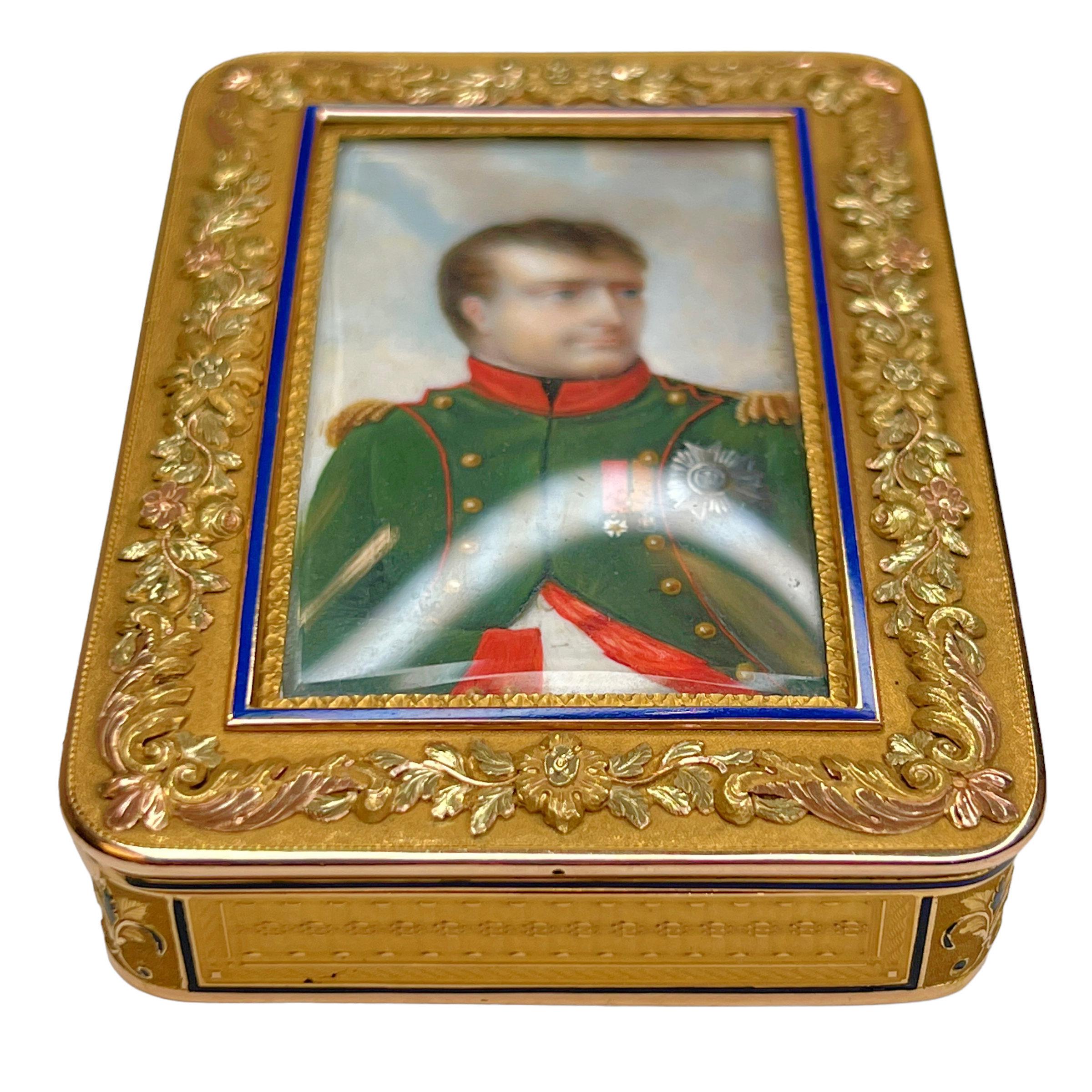 Our gold snuff box is distinguished by its exceptional portrait of Emperor Napoleon I (1769-1821) by the revered miniature painter, Jean-Baptiste Isabey (1767–1855), signed and dated 1807. Isabey portrays the emperor in the green uniform of the