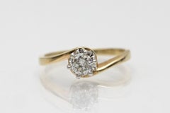 Anello solitario in oro con diamante, metà del XX secolo.