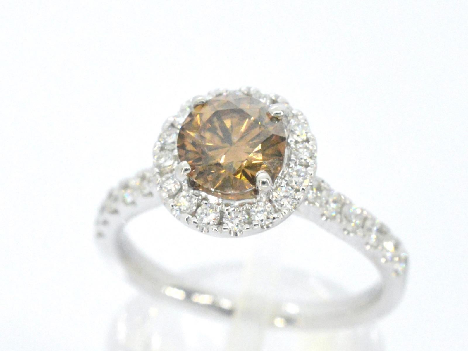 Contemporary Gold Solitaire Ring with Diamonds For Sale