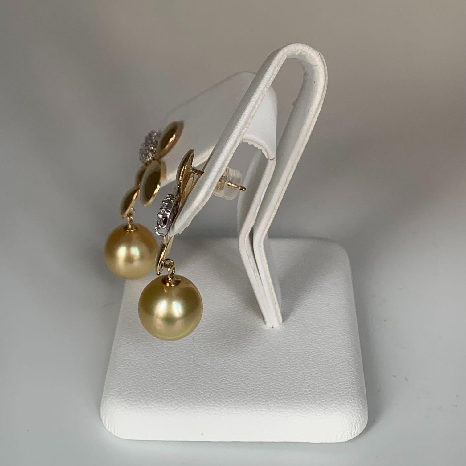 Celebrate our latest Summer / Spring Collection with large and luminous Gold South Sea Pearl 18K Gold Diamond Earrings. Sophisticated and unique, these earrings can be worn day or night.

South Sea Pearls are cultivated in the warm South Pacific