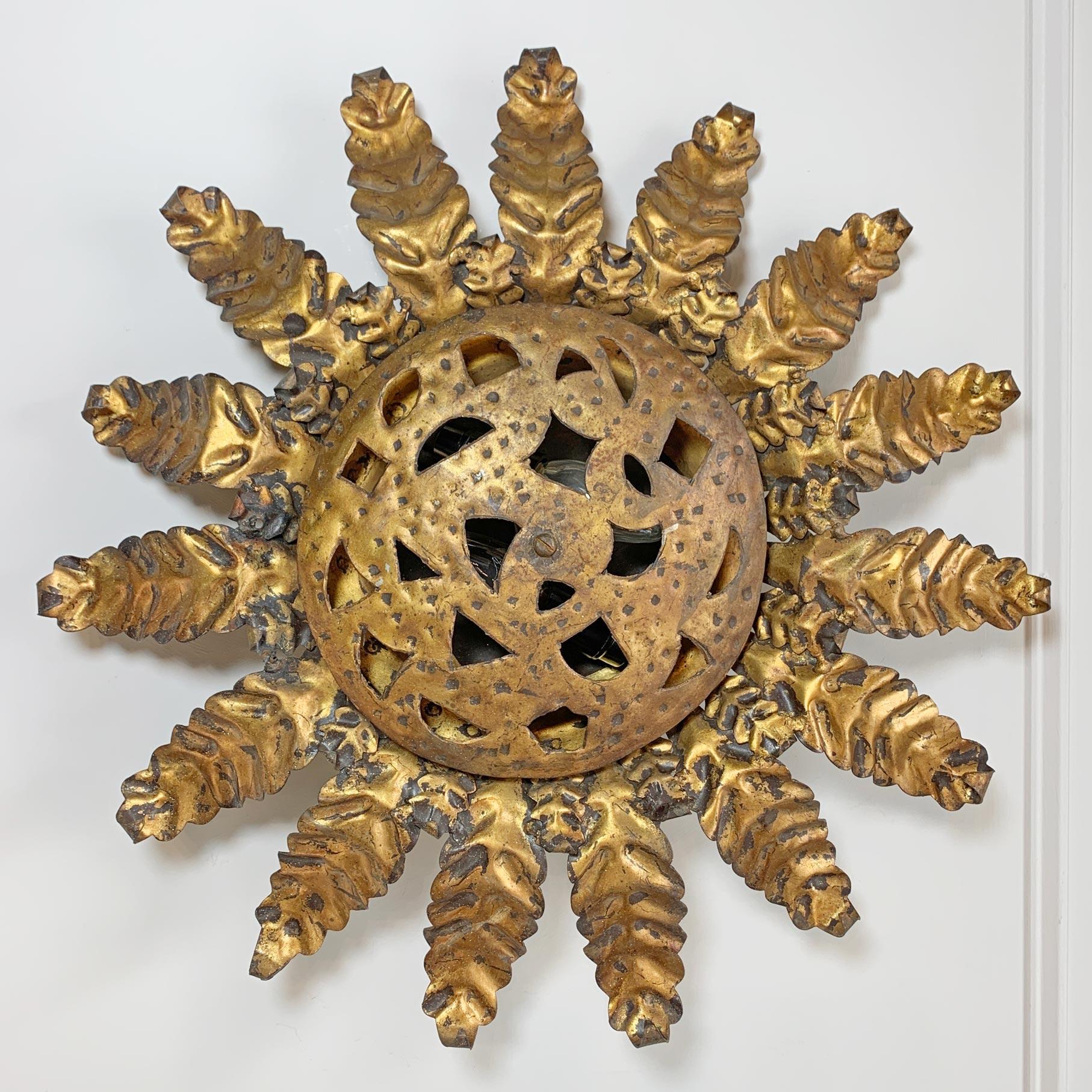 Brutalist Gold Spanish Sunburst Light with Perforate Decorative Plate For Sale