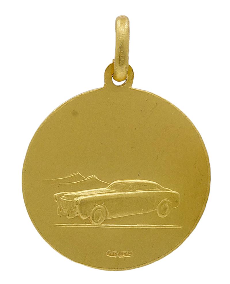 Italian 18K yellow gold St. Christopher medal.  Around the image is engraved: 