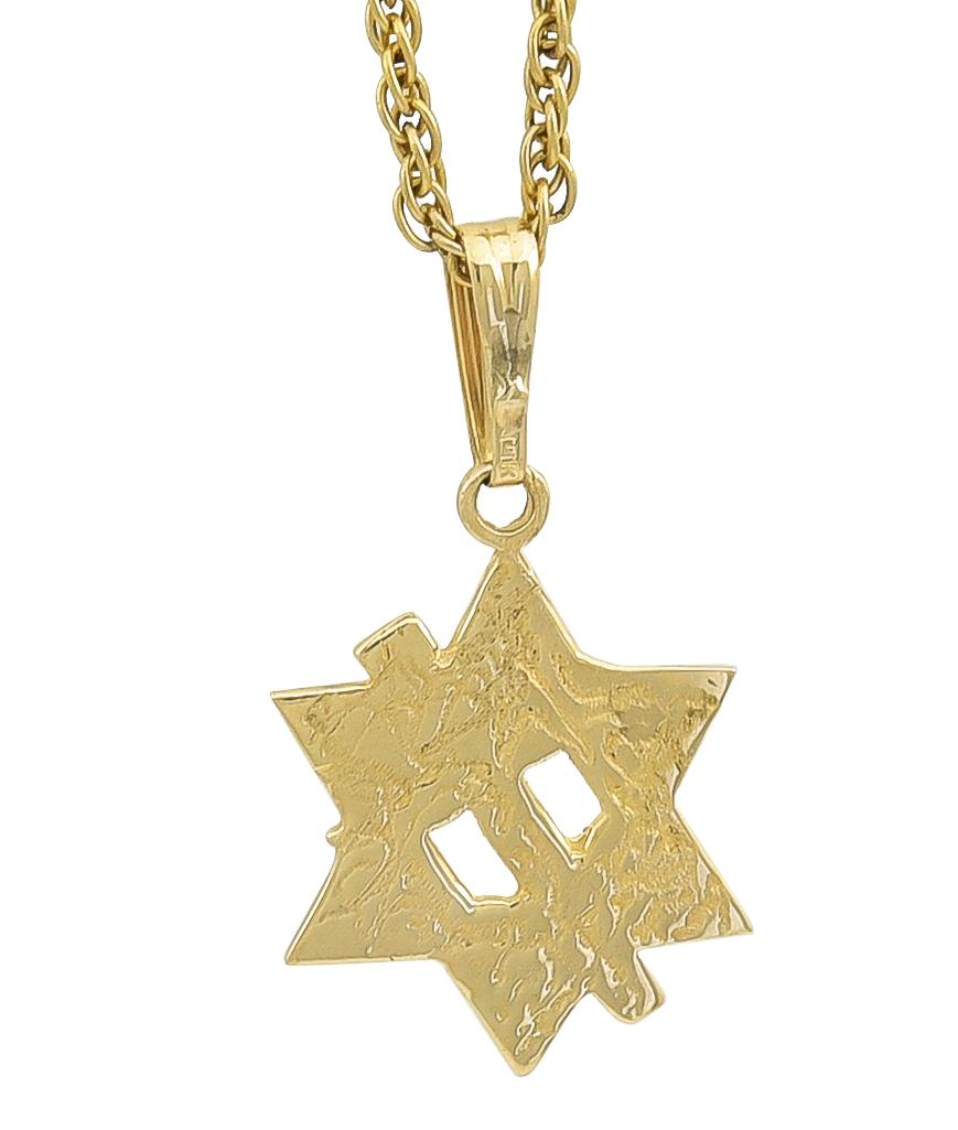 Rare charm, showing an intertwined Star of David with a cross.  14K yellow gold.  Fine engraved pattern on reverse side.  5/8