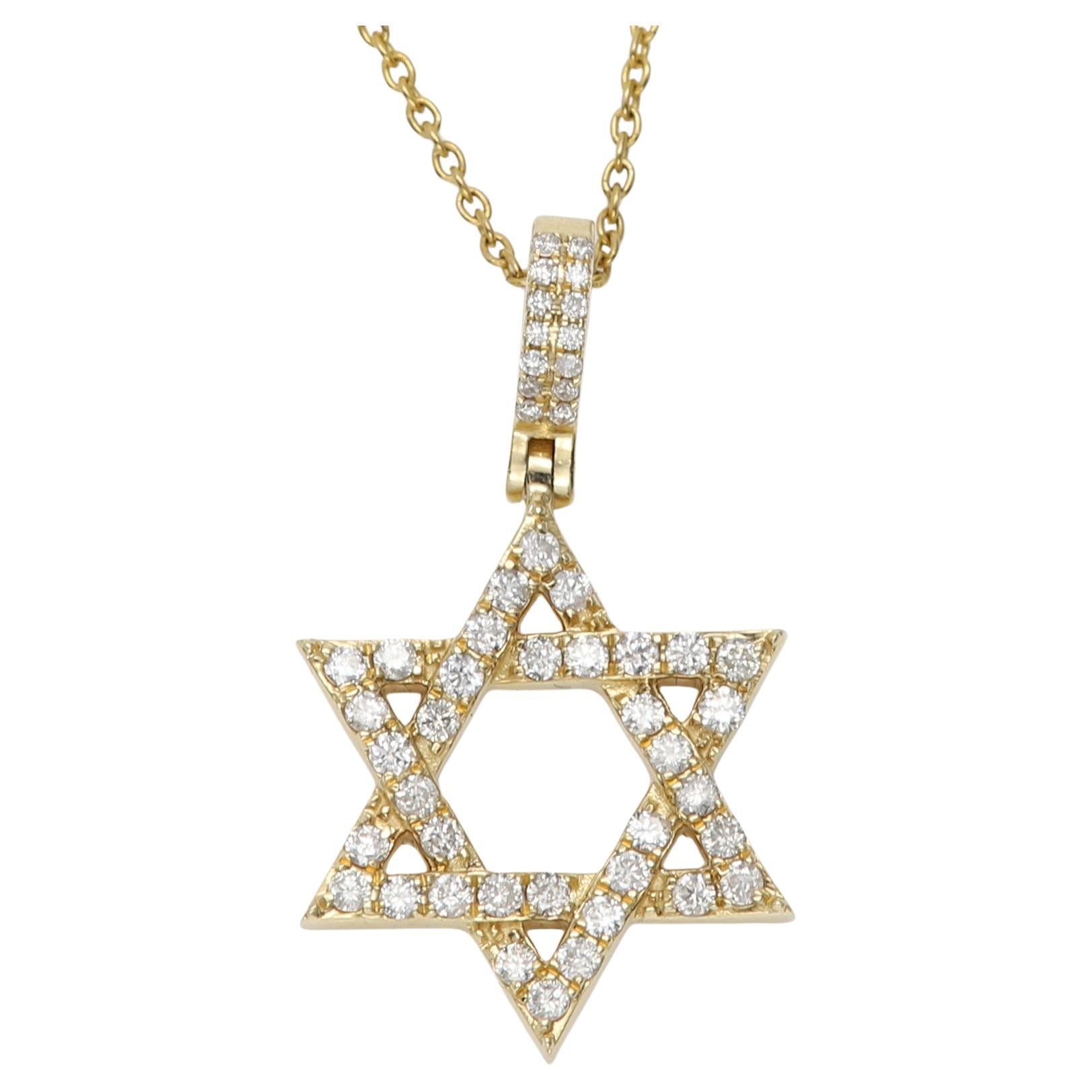 Hand made Star of David Diamond Pendant
Set in 14k Yellow Gold approx weight 3.50 grams
Natural Diamonds approx 0.65 carat H-SI
Star size approx 15 x 20 mm (cute size not too small not too big)
Sold as pendant only, chain not included.
Appraisal is
