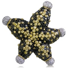 Broche étoile de mer en or 18k avec diamant, rubis et saphir par Alex Soldier