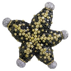 Broche étoile de mer en or 18k avec diamant, rubis et saphir par Alex Soldier
