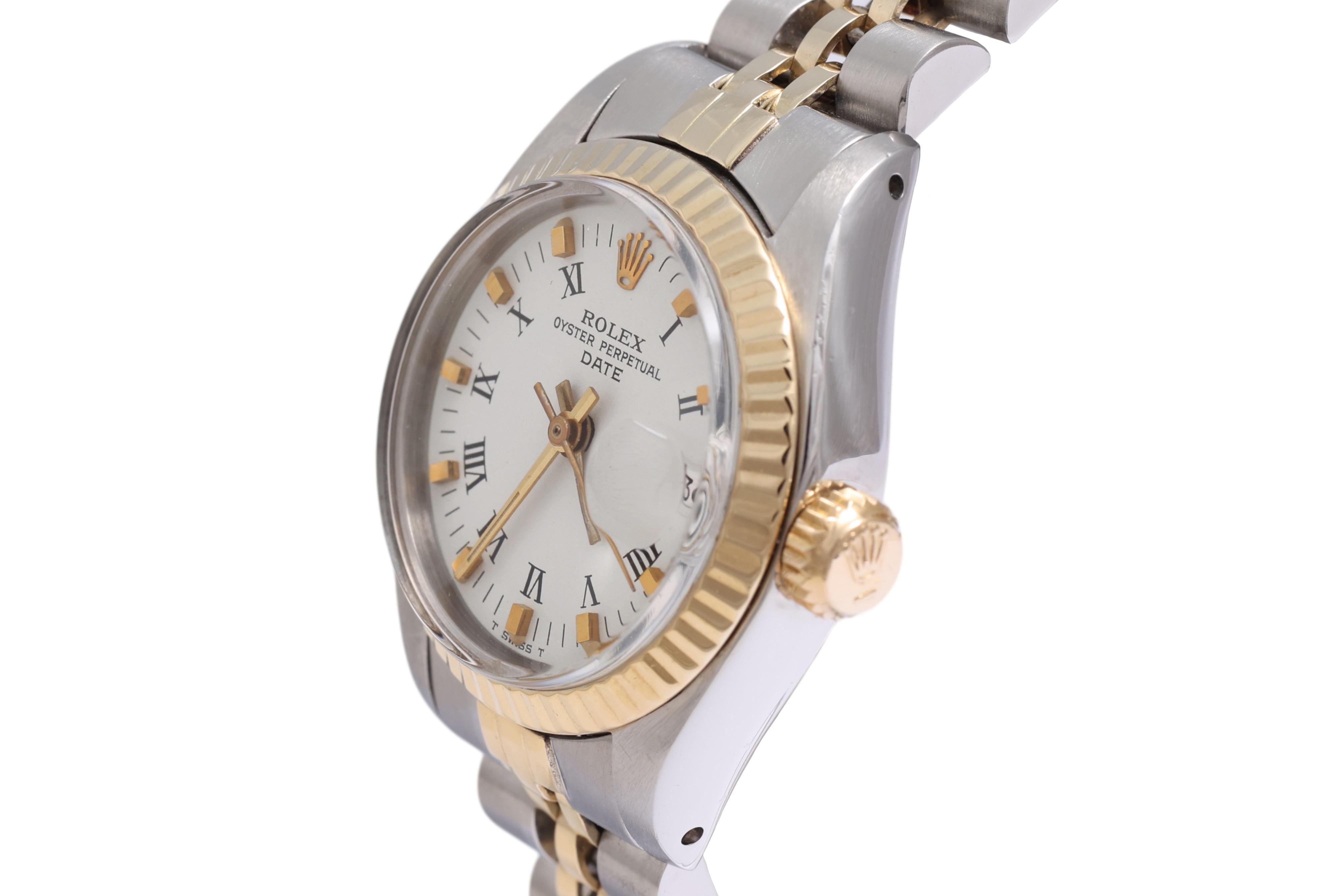 Gold & Steel Rolex Lady Oyster Date , Ref 6917, Automatic Wrist Watch

Dial : White with Roman Numerals

Case : Gold & Stainless Steel , 26mm

Strap : Gold & Steel , to fit a 16 cm wrist (extra links can be added )

Movement : Mechanical with