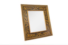 Miroir avec cadre en pochoir doré